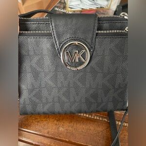 Black & Silver Leather Michael Kors cross body bag in like new condition